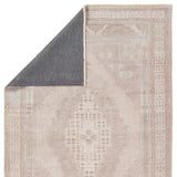 Distressed, vintage designs offer an elevated tone for the Lumal Collection. The Orame rug features a Southwestern-inspired medallion, geometric border, and intricate detailing in tones of mauve, light blue, brown, and cream. This machine washable rug is stain resistant and easy to clean, perfect for homes with children and pets. Amethyst Home provides interior design, new home construction design consulting, vintage area rugs, and lighting in the Seattle metro area.