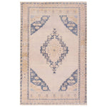 Featuring Lumal Debolo Rug by Jaipur Living at Amethyst Home. Distressed, vintage designs offer an elevated tone for the Lumal Collection. The Debolo rug features a vintage-inspired medallion, geometric border, and floral detailing in tones of tan, blue, yellow, and gray. This machine washable rug is stain resistant and easy to clean, perfect for homes wit. Amethyst Home provides interior design, new home construction design consulting, vintage area rugs, and lighting in the Alpharetta metro area.