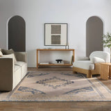 Featuring Lumal Debolo Rug by Jaipur Living at Amethyst Home. Distressed, vintage designs offer an elevated tone for the Lumal Collection. The Debolo rug features a vintage-inspired medallion, geometric border, and floral detailing in tones of tan, blue, yellow, and gray. This machine washable rug is stain resistant and easy to clean, perfect for homes with ch. Amethyst Home provides interior design, new home construction design consulting, vintage area rugs, and lighting in the Austin metro area.