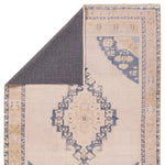 Distressed, vintage designs offer an elevated tone for the Lumal Collection. The Debolo rug features a vintage-inspired medallion, geometric border, and floral detailing in tones of tan, blue, yellow, and gray. This machine washable rug is stain resistant and easy to clean, perfect for homes with children and pets. Amethyst Home provides interior design, new home construction design consulting, vintage area rugs, and lighting in the Dallas metro area.