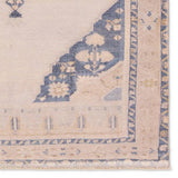 Distressed, vintage designs offer an elevated tone for the Lumal Collection. The Debolo rug features a vintage-inspired medallion, geometric border, and floral detailing in tones of tan, blue, yellow, and gray. This machine washable rug is stain resistant and easy to clean, perfect for homes with children and pets. Amethyst Home provides interior design, new home construction design consulting, vintage area rugs, and lighting in the Omaha metro area.