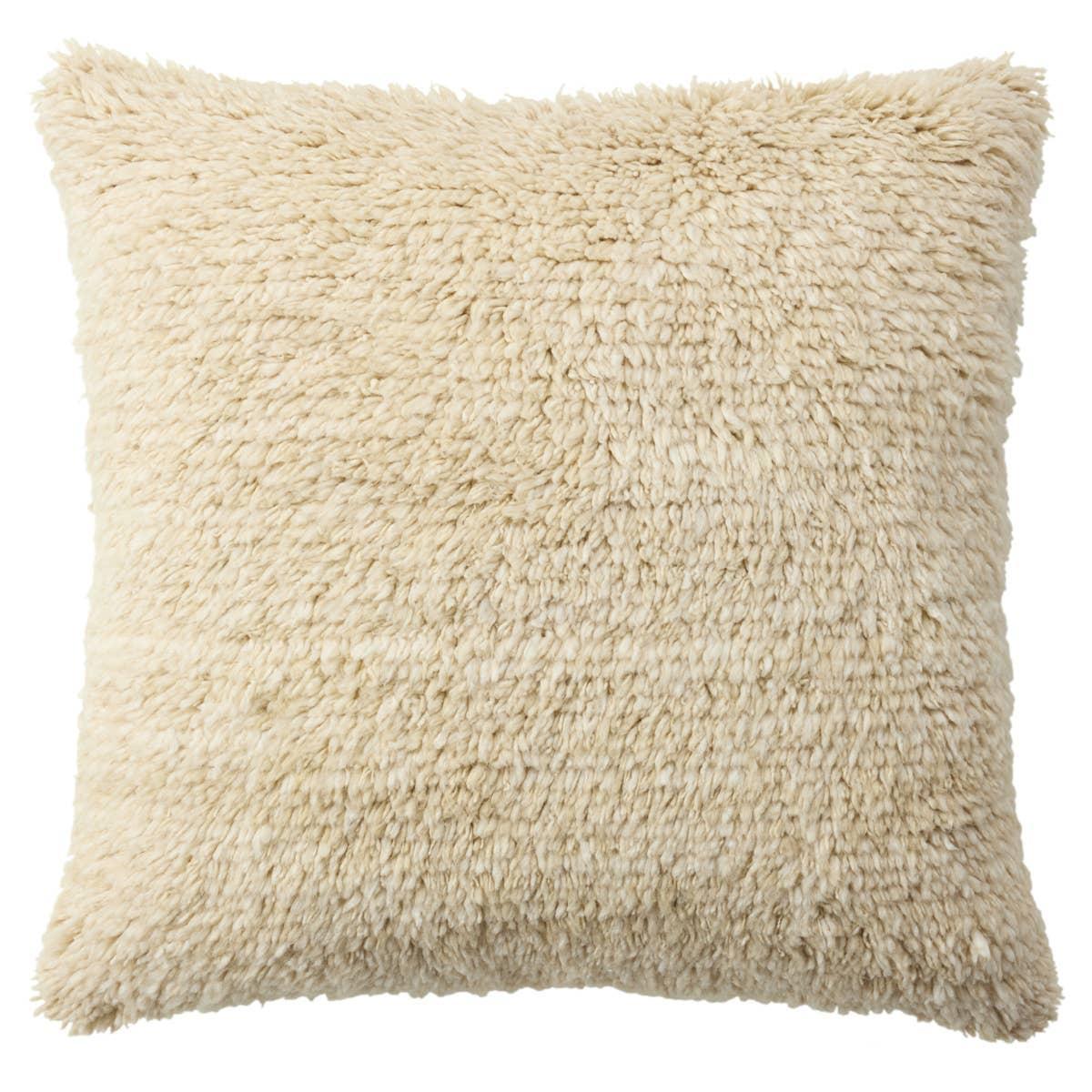 The hand-knotted Montane Jardine imbues spaces with modern Moroccan vibes and high-quality craftsmanship. This richly textured assortment of pillows features premium wool and silk blended fibers and an exceptional Persian knot quality. The shag Jardine pillow delights in a cozy cream colorway, creating an easy-to-decorate-with accent piece. Amethyst Home provides interior design, new home construction design consulting, vintage area rugs, and lighting in the Dallas metro area.