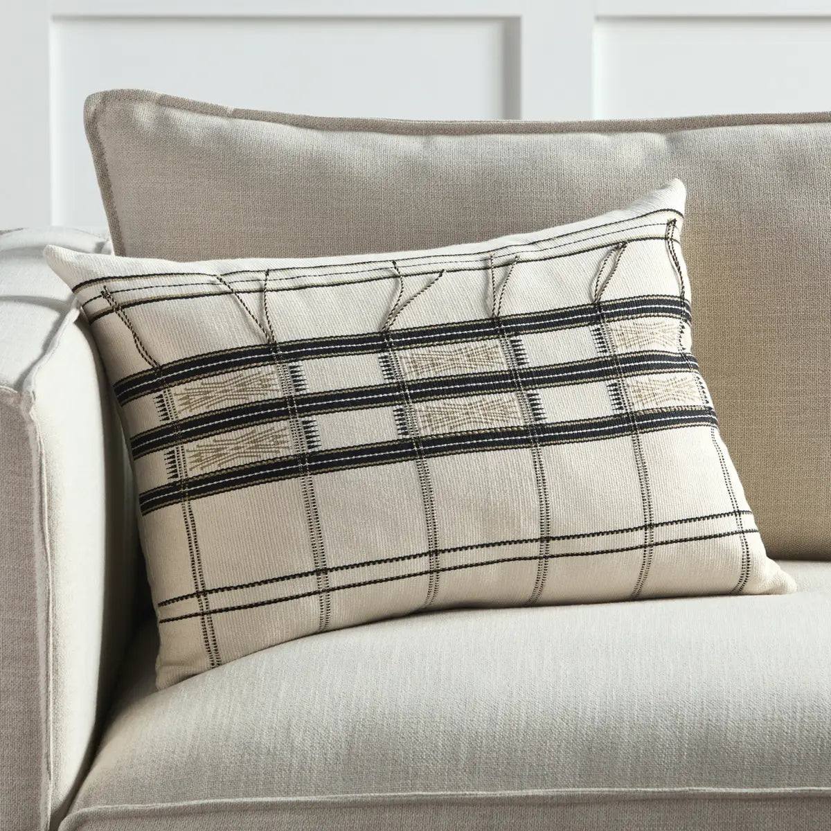 The Nagaland Merima Pillow showcases the traditional loin-loom techniques of the indigenous tribes of the region. The artisan-made Merima throw pillow effortlessly combines heritage-rich tribal and stripe patterns with a versatile black, cream, and tan colorway for a stunning statement in any space. Amethyst Home provides interior design services, furniture, rugs, and lighting in the Miami metro area.