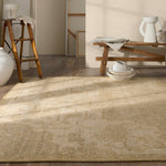 The Onessa collection marries traditional motifs with soft, subdued colorways for the perfect blend of fresh and time-honored style. These hand-knotted wool rugs feature a hand-sheared quality that lends the design a coveted vintage impression. The Danet rug features a distressed, floral pattern in hues of tan, gold, taupe, cream, and hints of green. Amethyst Home provides interior design, new construction, custom furniture, and area rugs in the Seattle metro area.
