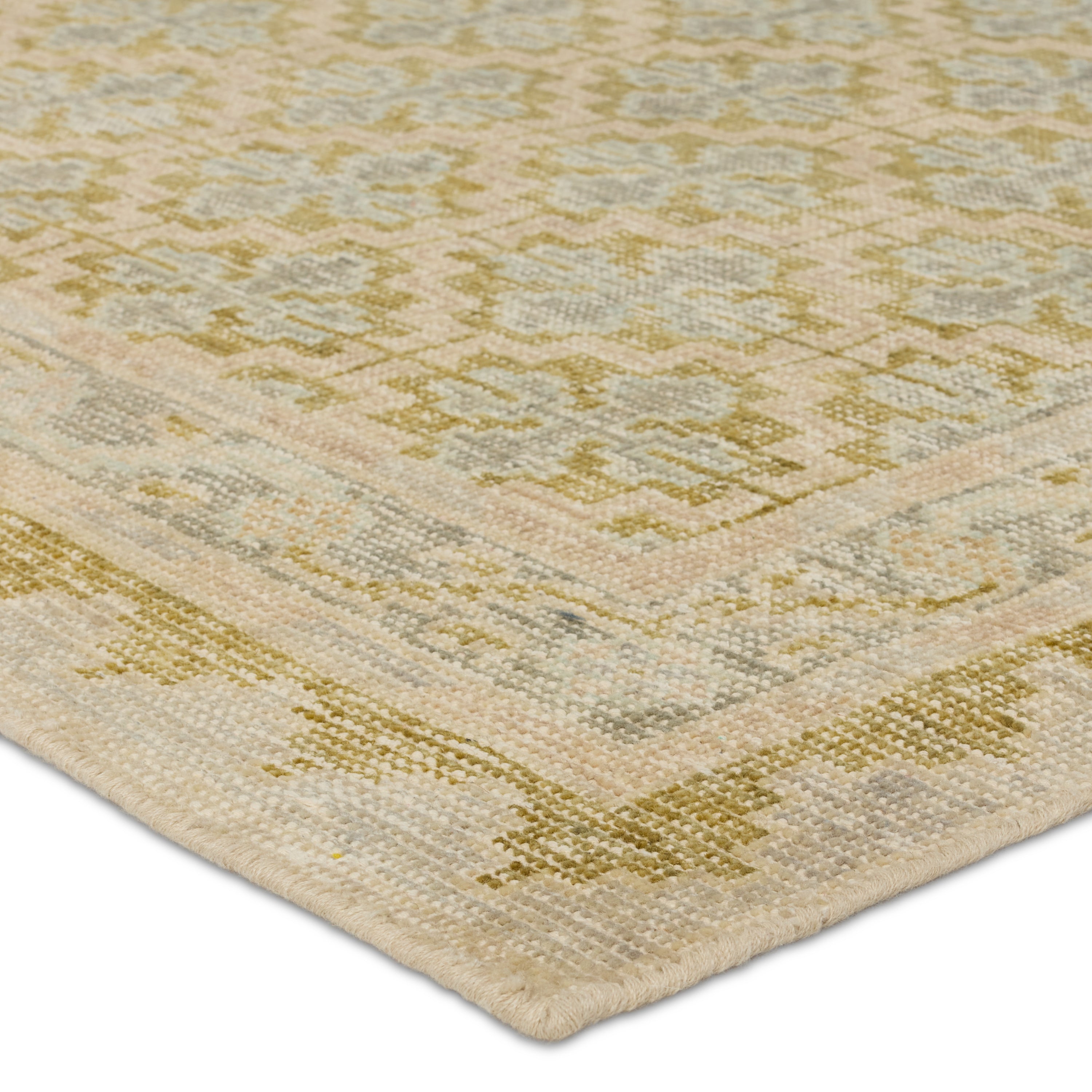 The Onessa collection marries traditional motifs with soft, subdued colorways for the perfect blend of fresh and time-honored style. These hand-knotted wool rugs feature a hand-sheared quality that lends the design a coveted vintage impression. The Mildred rug features a tile and mini-medallion pattern in hues of blue, green, cream, taupe, and gray. Amethyst Home provides interior design, new construction, custom furniture, and area rugs in the Calabasas metro area.