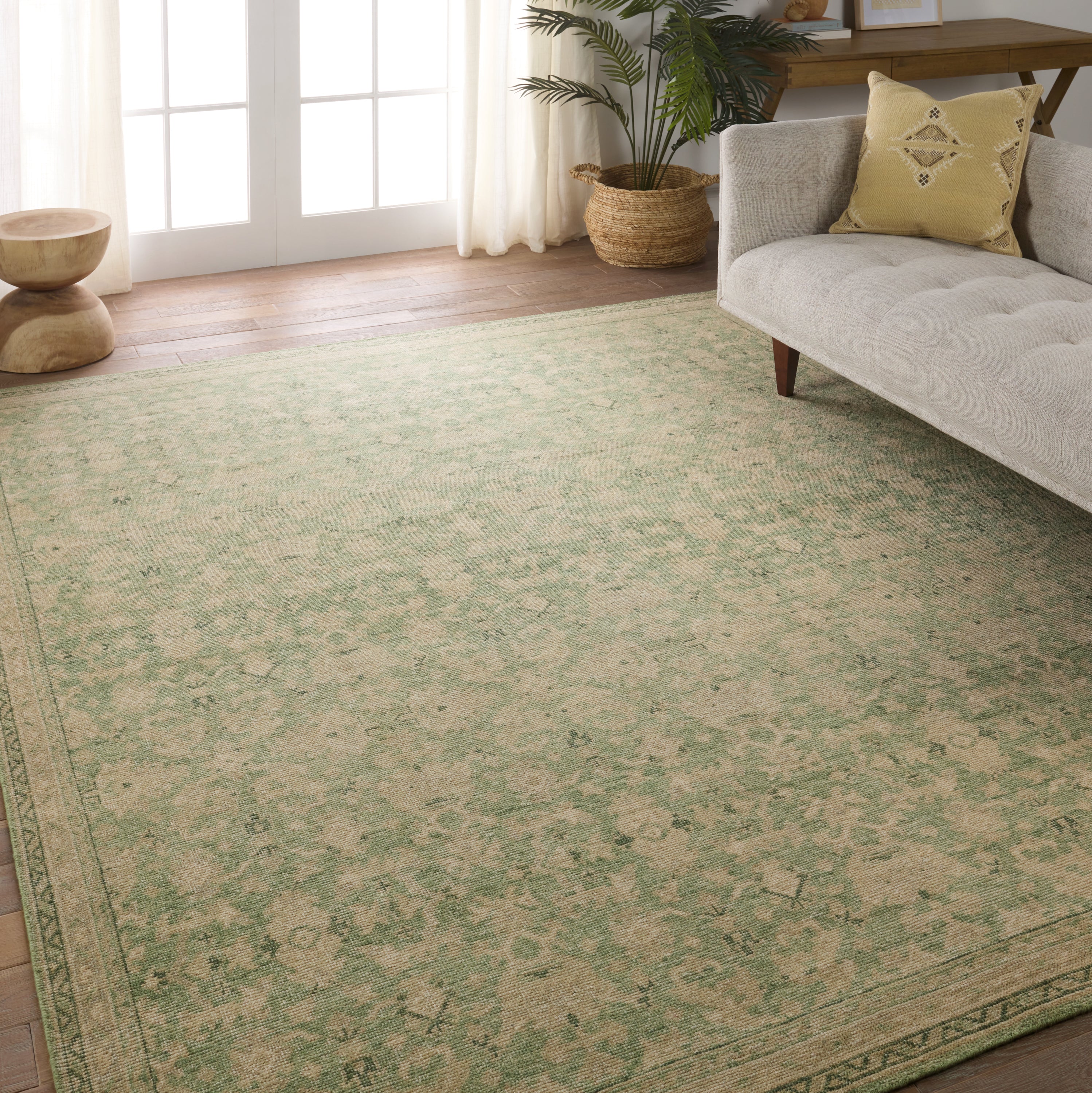 The Onessa collection marries traditional motifs with soft, subdued colorways for the perfect blend of fresh and time-honored style. These hand-knotted wool rugs feature a hand-sheared quality that lends the design a coveted vintage impression. The Rowland rug features a distressed, floral trellis pattern in hues of green, tan, and cream. Amethyst Home provides interior design, new construction, custom furniture, and area rugs in the Newport Beach metro area.