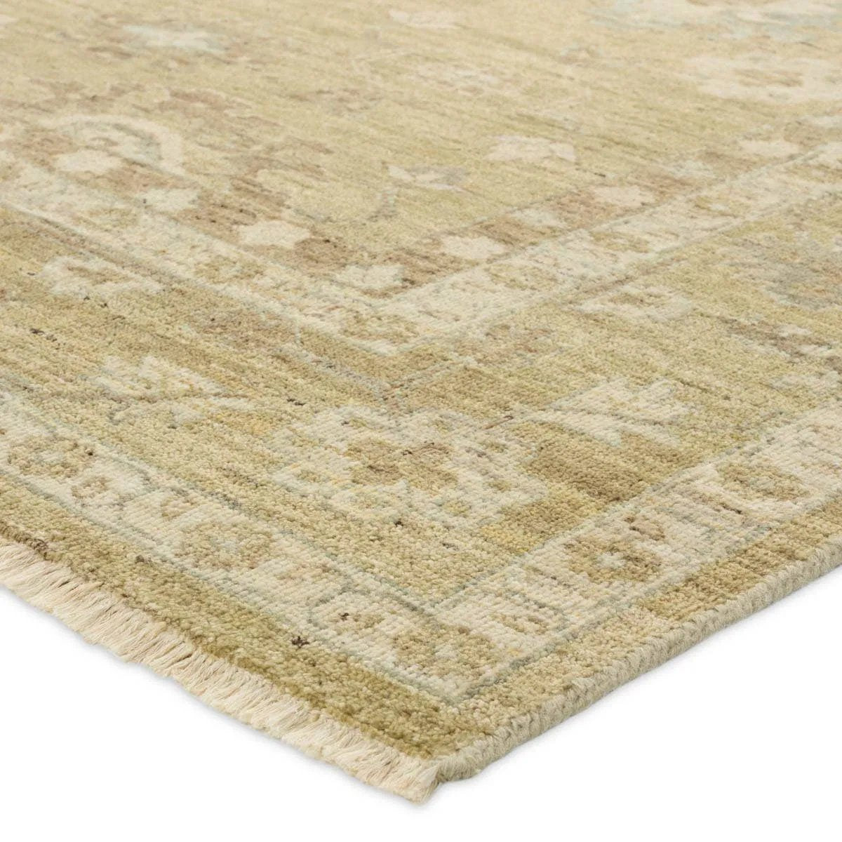 The Onessa Khalla marries traditional motifs with soft, subdued colorways for the perfect blend of fresh and time-honored style. These hand-knotted wool rugs feature a hand-sheared quality that lends the design a coveted vintage impression. The Challa rug features a floral, trellis pattern in cream and green with accents of taupe and brown. Amethyst Home provides interior design, new home construction design consulting, vintage area rugs, and lighting in the Winter Garden metro area.