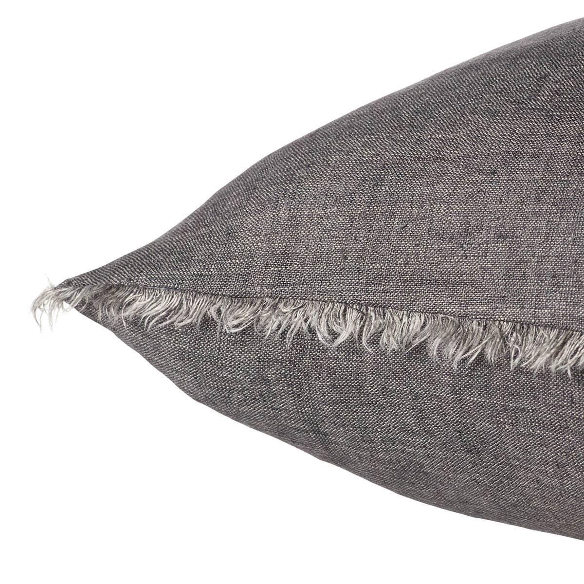 Linen is a fiber that takes on a soft beauty the more it is washed and worn ? its beauty is shaped by daily life. The handmade Cassis pillow features a soft charcoal color and a natural fringe on all sides. The gentle texture brings subtle sophistication to any contemporary home.Indoor Pillow Amethyst Home provides interior design, new home construction design consulting, vintage area rugs, and lighting in the Houston metro area.