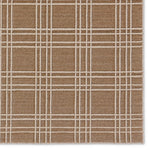 The indoor-outdoor Paradizo collection features durable, weather-resistant fibers that create a flatwoven, natural look. Emanating the colors and tone of grass fibers, the Barrett rug boasts a neutral, grounding palette. The textural grid design paired with the colorway of brown and cream highlight the easily styled nature of this accent piece. Amethyst Home provides interior design, new home construction design consulting, vintage area rugs, and lighting in the Tampa metro area.