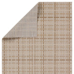 The indoor-outdoor Paradizo collection features durable, weather-resistant fibers that create a flatwoven, natural look. Emanating the colors and tone of grass fibers, the Cecily rug boasts a neutral, grounding palette. The textural grid design paired with the colorway of brown and cream highlight the easily styled nature of this accent piece. Amethyst Home provides interior design, new home construction design consulting, vintage area rugs, and lighting in the Calabasas metro area.