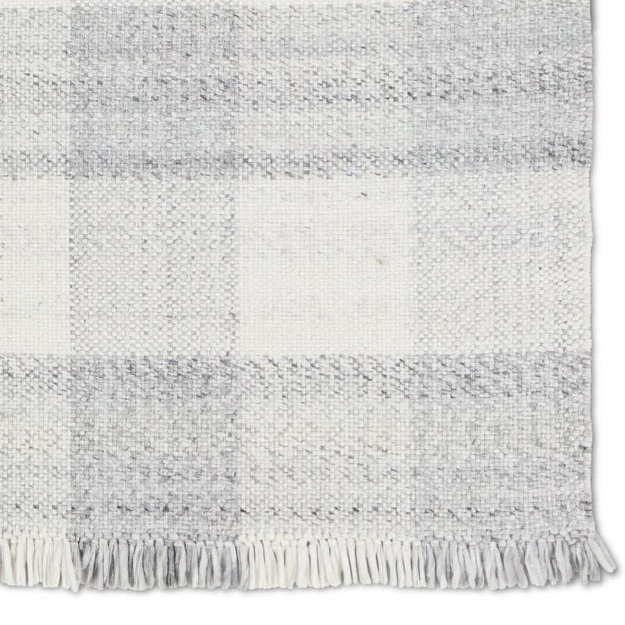 The Respite collection of handwoven designs showcases a fresh take on a classic pattern. Crafted of durable and easy-to clean polyester, these soft and fringe-detailed rugs lend a timeless charm to any space. The Truce design exudes a farmhouse and contemporary vibe with a pleasant gray and ivory colorway. Amethyst Home provides interior design, new construction, custom furniture, and area rugs in the Des Moines metro area.