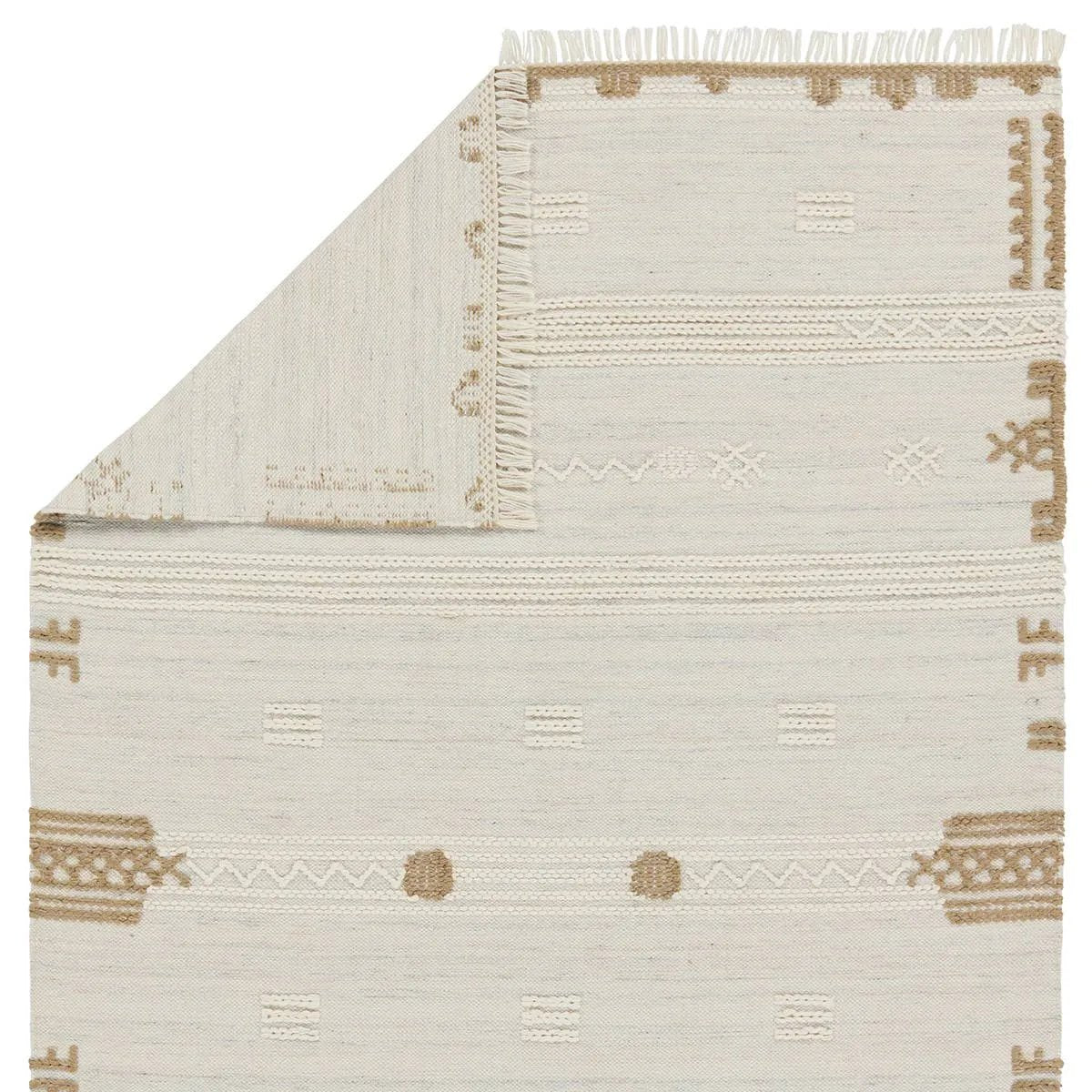 The Revelry collection marries global modernity with durable, performance fibers. The light and airy Noble area rug boasts a captivating, tribal stripe design in a stunning ivory, brown, cream, gray, and black colorway. Amethyst Home provides interior design, new home construction design consulting, vintage area rugs, and lighting in the Charlotte metro area.