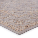 The Revolution Wyndham rug is inspired by traditional style and beautifully detailed antique textile designs. The hand-knotted Wyndham area rug showcases a classic motif in neutral tones of gray and warm tan. Amethyst Home provides interior design services, furniture, rugs, and lighting in the Omaha metro area.