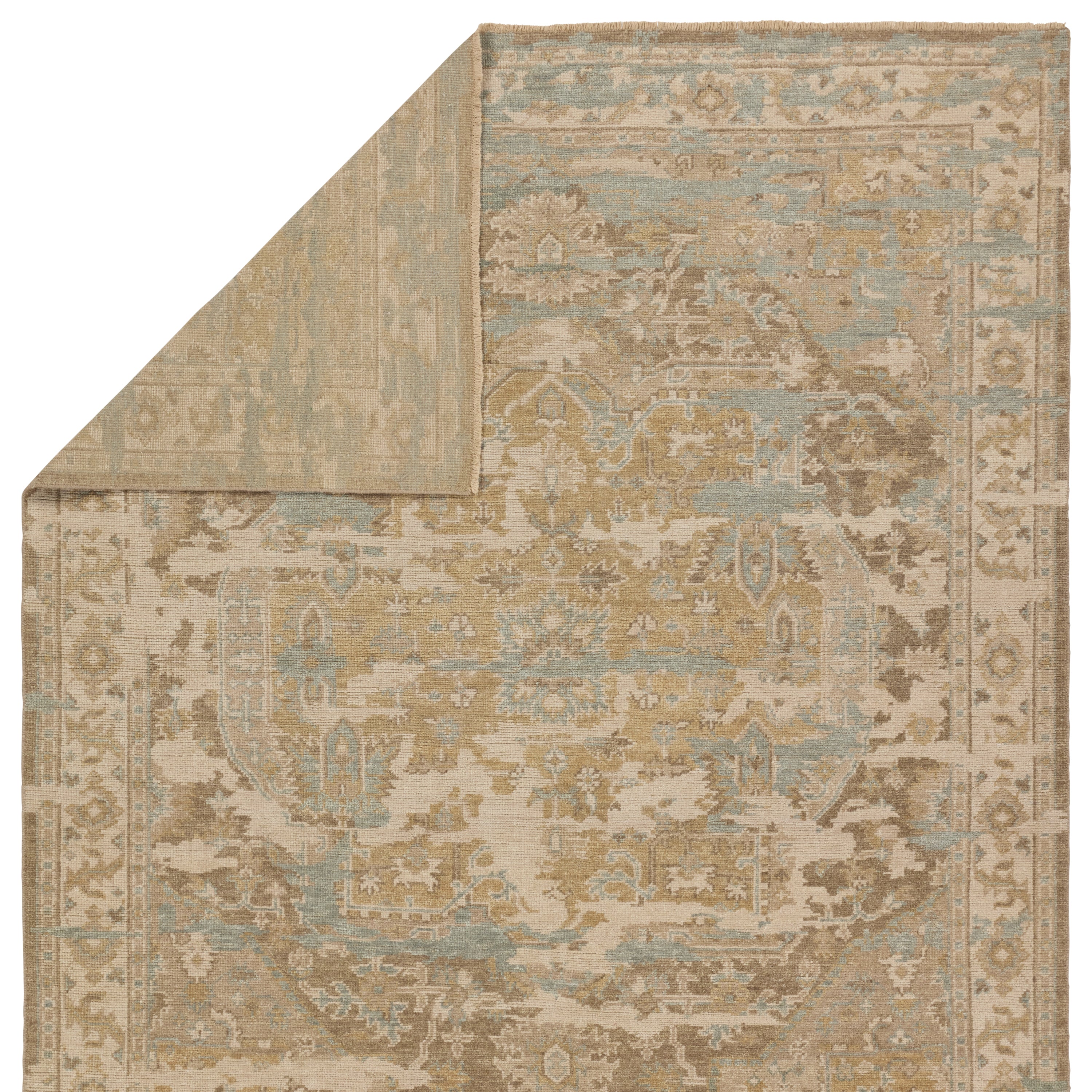 The Rhapsody collection features heirloom-quality designs of stunningly abrashed Old World patterns. The Cadenza area rug boasts a beautifully distressed medallion motif with a decorative border. The khaki tones are accented with slate, beige, cream, and taupe hues for added depth and intrigue. This durable wool handknot anchors living spaces with a fresh take on vintage style. Amethyst Home provides interior design, new construction, custom furniture, and area rugs in the Dallas metro area.