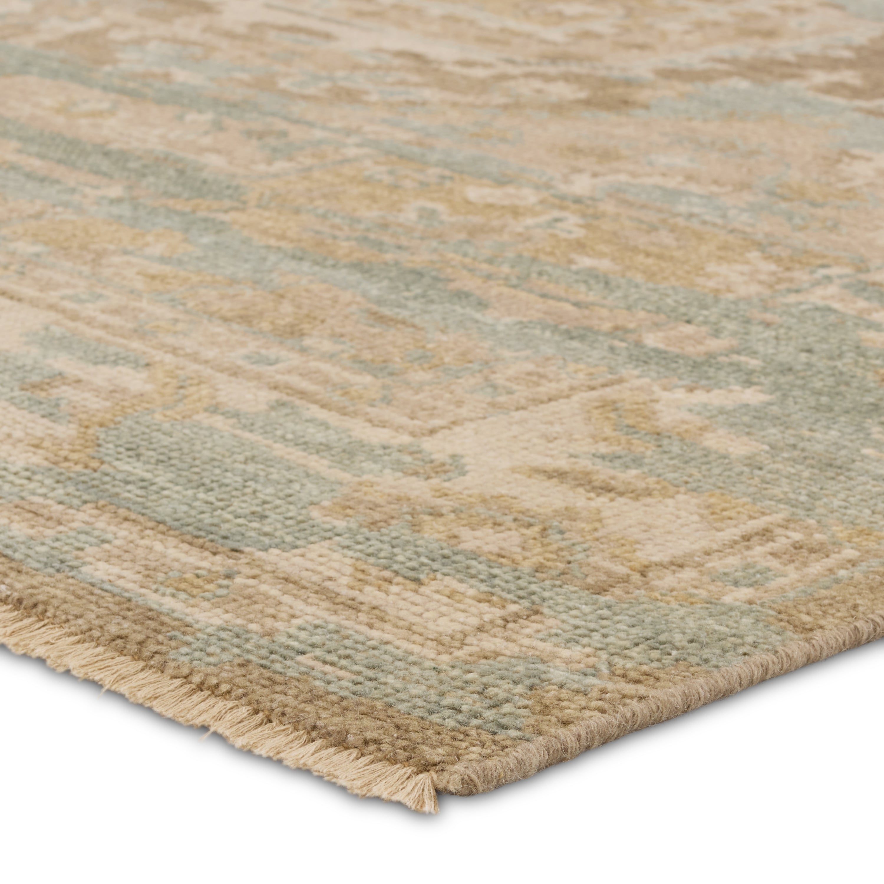 The Rhapsody collection features heirloom-quality designs of stunningly abrashed Old World patterns. The Cadenza area rug boasts a beautifully distressed medallion motif with a decorative border. The khaki tones are accented with slate, beige, cream, and taupe hues for added depth and intrigue. This durable wool handknot anchors living spaces with a fresh take on vintage style. Amethyst Home provides interior design, new construction, custom furniture, and area rugs in the Monterey metro area.