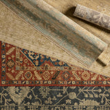 The Rhapsody collection features heirloom-quality designs of stunningly abrashed Old World patterns. The Lucius area rug boasts a beautifully washed center-medallion with a decorative border. The red tones are accented with blue, black, cream, orange, and brown hues for added depth and intrigue. This durable wool handknot anchors living spaces with a fresh take on vintage style. Amethyst Home provides interior design, new construction, custom furniture, and area rugs in the Houston metro area.