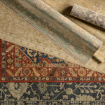 The Rhapsody collection features heirloom-quality designs of stunningly abrashed Old World patterns. The Maeli area rug boasts a beautifully washed Oushak motif with a decorative border. The dark gray tones are accented with khaki, cream, green, and beige hues for added depth and intrigue. This durable wool handknot anchors living spaces with a fresh take on vintage style. Amethyst Home provides interior design, new construction, custom furniture, and area rugs in the San Diego metro area.