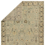 The Rhapsody Markid features heirloom-quality designs of stunningly abrashed Old World patterns. The Markid area rug boasts a beautifully distressed floral and Oushak motif with a decorative border. The light blue and tan tones are accented with black and beige hues for added depth and intrigue. Amethyst Home provides interior design, new home construction design consulting, vintage area rugs, and lighting in the Charlotte metro area.