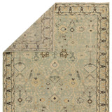 The Rhapsody Markid features heirloom-quality designs of stunningly abrashed Old World patterns. The Markid area rug boasts a beautifully distressed floral and Oushak motif with a decorative border. The light blue and tan tones are accented with black and beige hues for added depth and intrigue. Amethyst Home provides interior design, new home construction design consulting, vintage area rugs, and lighting in the Charlotte metro area.