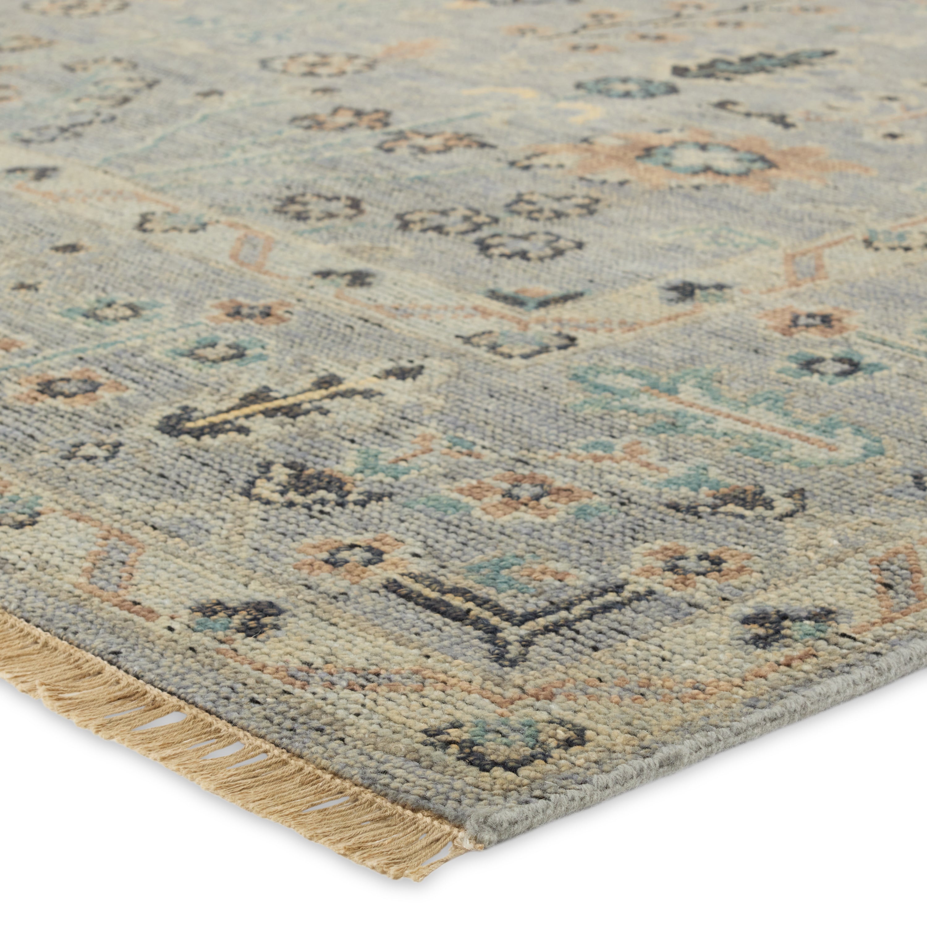 The Rhapsody collection features heirloom-quality designs of stunningly abrashed Old World patterns. The Nysa area rug boasts a beautifully washed floral motif with a decorative border. The blue tone is accented with rich green, tan, navy, and cream hues for added depth and intrigue. This durable wool handknot anchors living spaces with a fresh take on vintage style. Amethyst Home provides interior design, new construction, custom furniture, and area rugs in the Des Moines metro area.