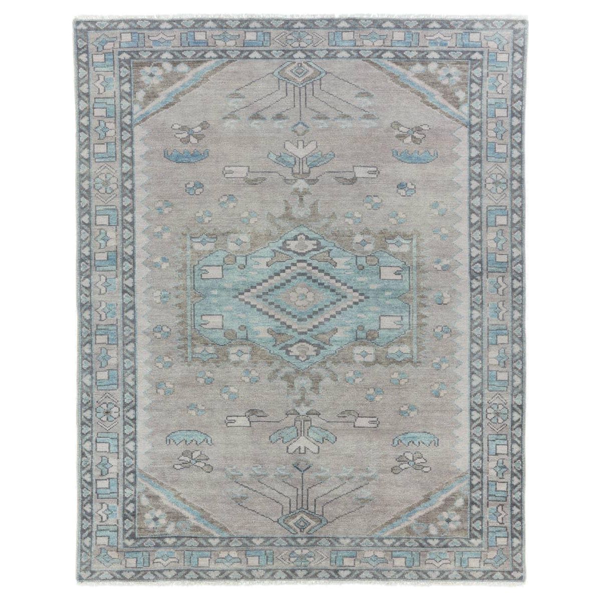 The Salinas Santita is punctuated by both vibrant and neutral hues and combined with intricate details, lending a stunning transitional look to any home. The Santita rug makes a moody statement with grounding hues and a tribal, medallion motifs. This durable, artisan-made rug features geometric accents in a serene gray, blue, and taupe colorway. Amethyst Home provides interior design, new home construction design consulting, vintage area rugs, and lighting in the Newport Beach metro area.