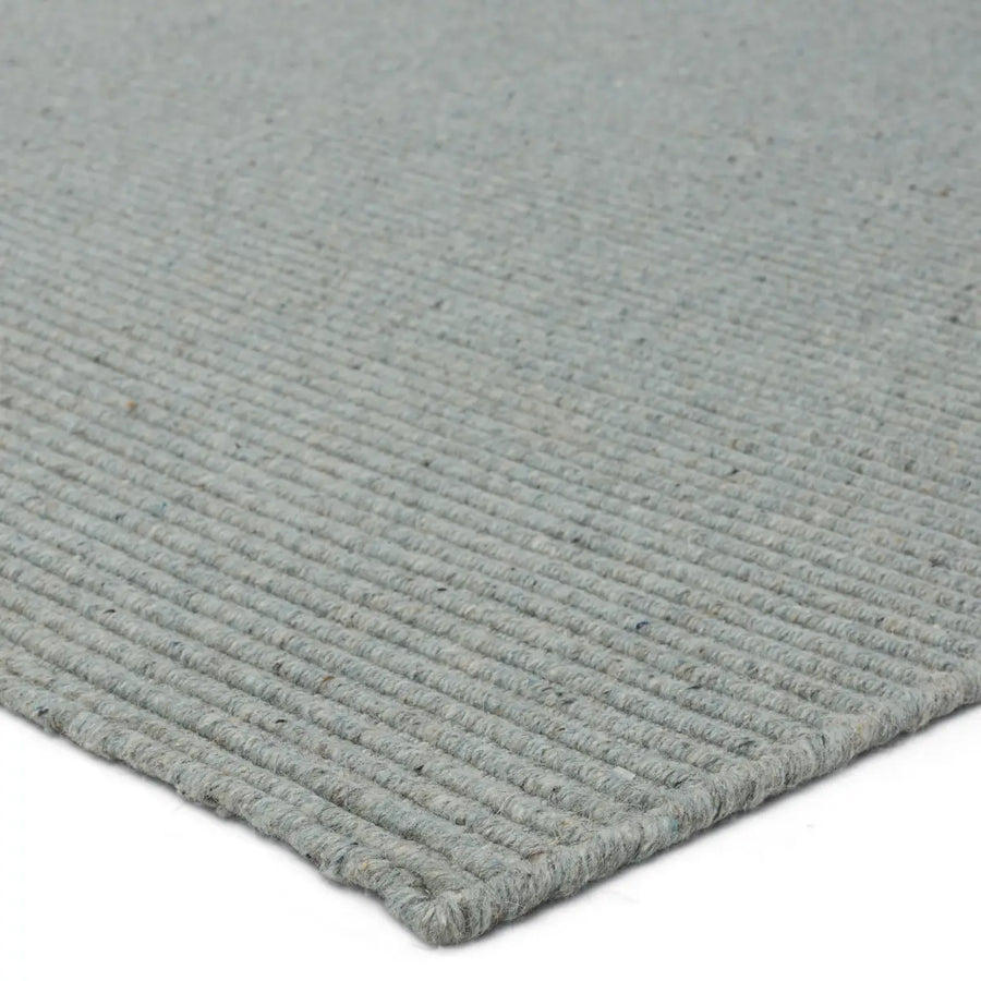 The Strada Shyre Blue Rug features a unique texture and casual comfort that effortlessly grounds spaces with a solid hue. This handwoven wool rug is crafted from undyed yarn for a distinctive, neutral colorway with natural variation for a bit of dimension. Amethyst Home provides interior design services, furniture, rugs, and lighting in the Des Moines metro area.
