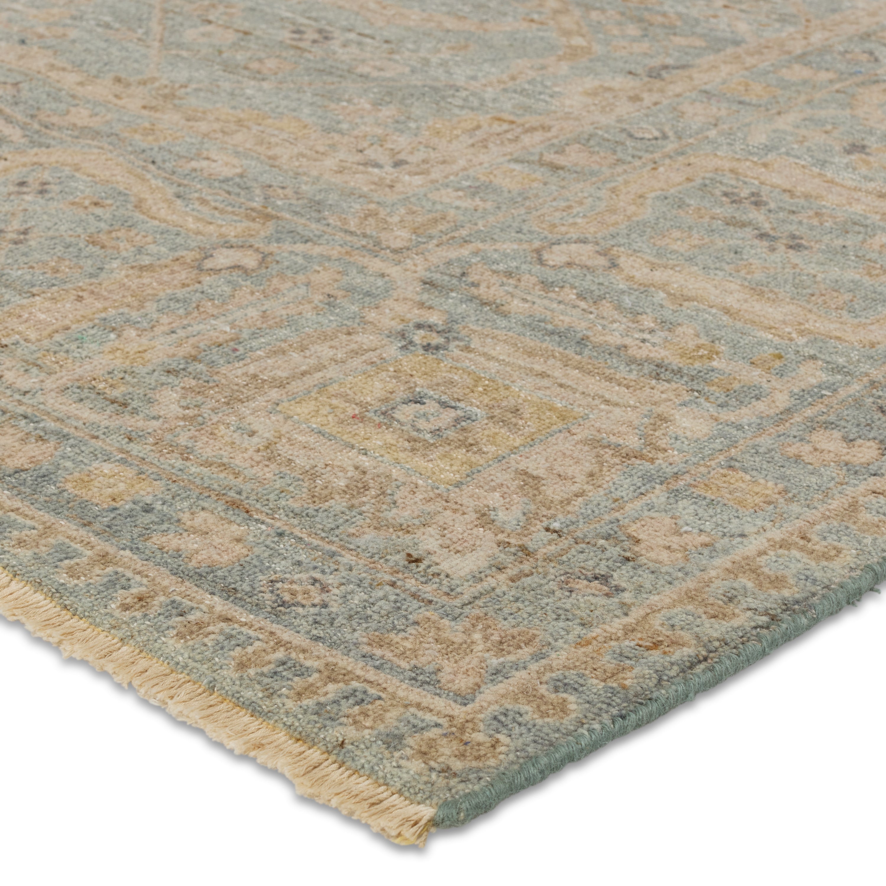 The vintage-inspired Tierzah collection features an antiqued wash and intricate traditional designs. The Maison wool rug boasts a Persian knot construction and tonal gray, tan, muted gold, and gray that grounds any space. This artisan-made rug features fringe trimmed details for a touch of global charm that pair perfectly with the intricate, floral trellis and border pattern. Amethyst Home provides interior design, new construction, custom furniture, and area rugs in the Washington metro area.