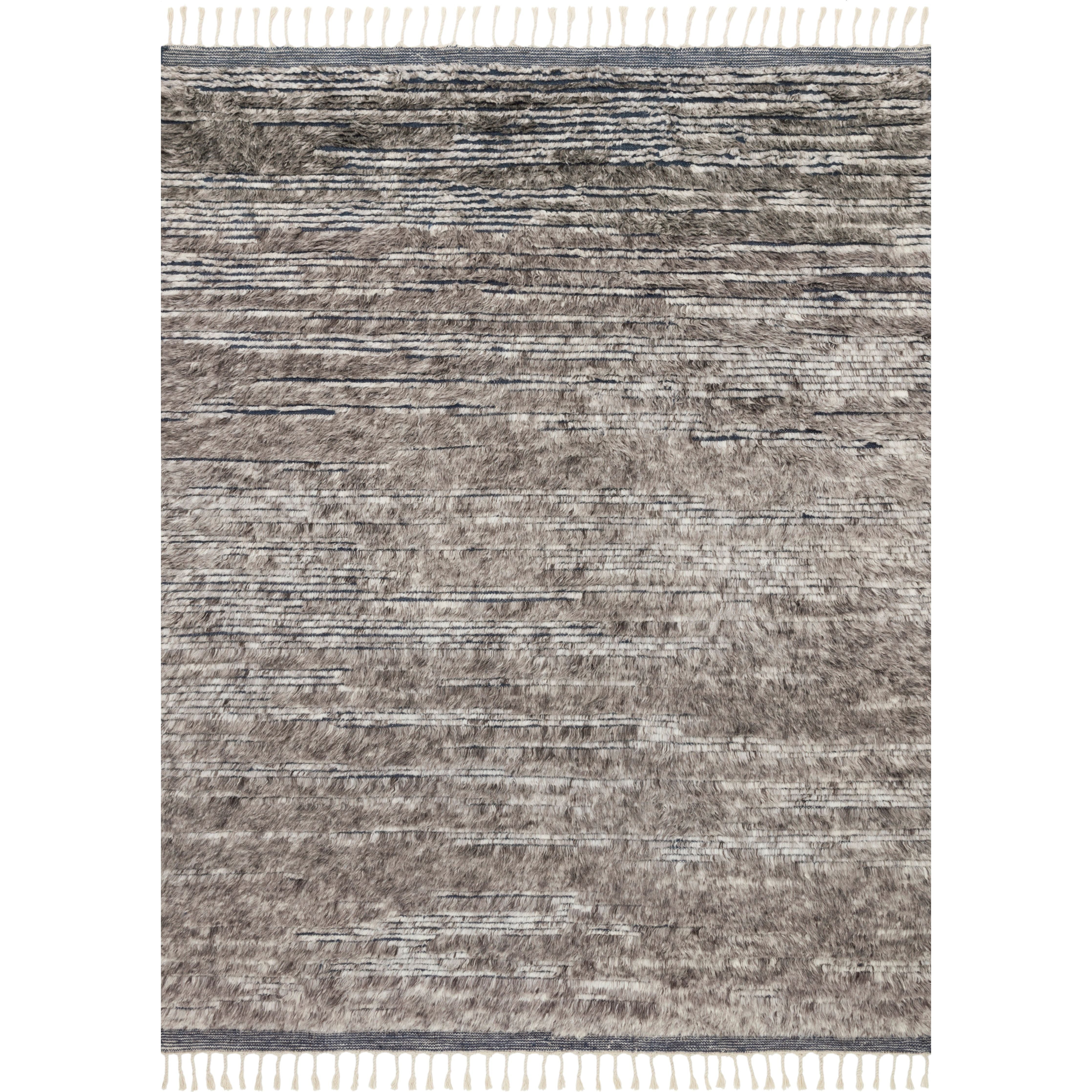 A nod to timeless Moroccan style, the Khalid Pewter/Ink or KF-04 Pewter/Ink, is hand-knotted in India by skilled artisans. The soft pile features 100% natural, undyed wool, lending slight variations in tones that make each piece it's own. Plus, each rug is finished with a thoughtfully designed fringe. 