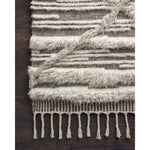 Khalid Ivory/Taupe Rug - Amethyst Home A nod to timeless Moroccan style, the Khalid Collection is hand-knotted in India by skilled artisans. The soft pile features 100% natural, undyed wool, lending slight variations in tones that make each piece it's own. Plus, each rug is finished with a thoughtfully designed fringe.