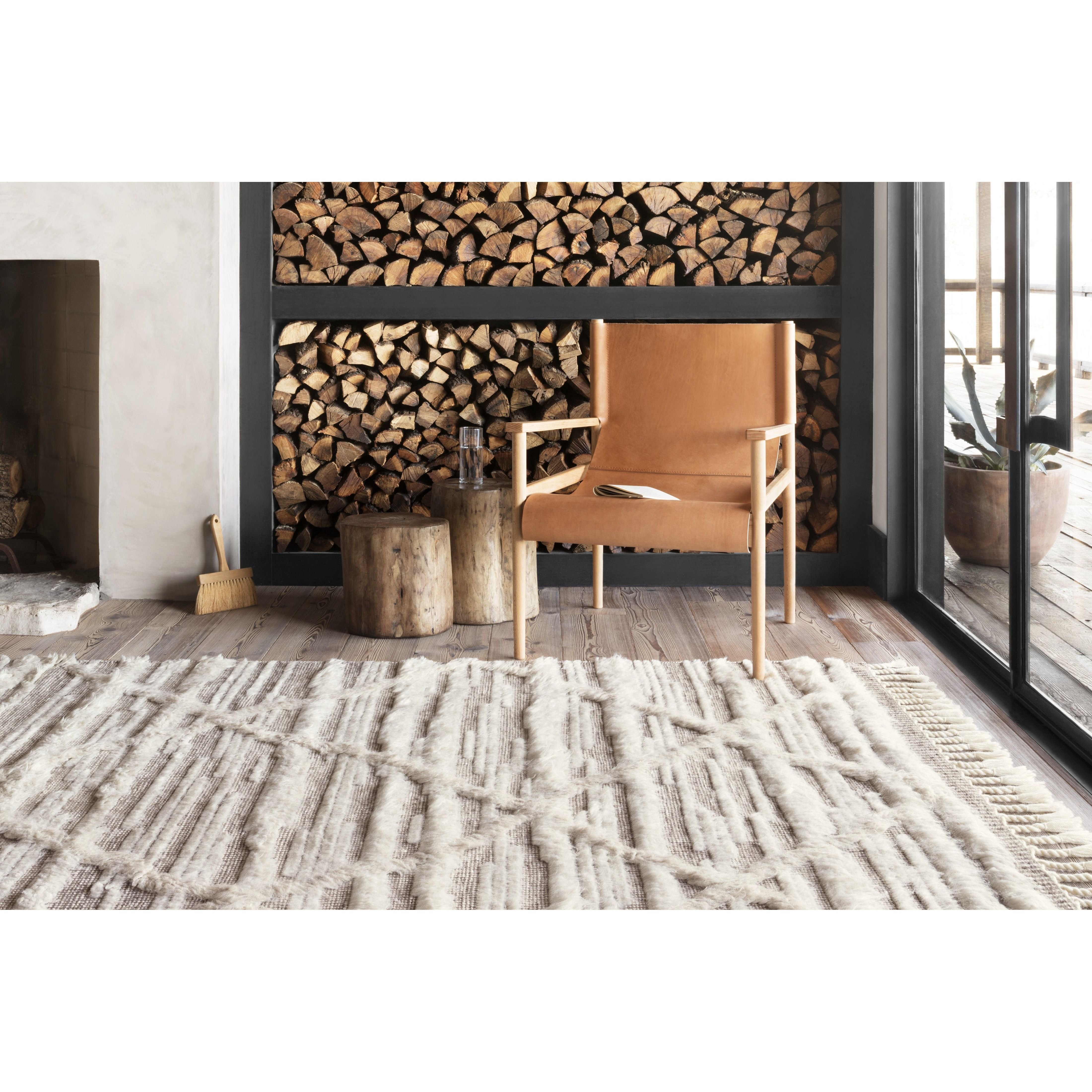 Featuring Khalid Ivory/Taupe Hand-Knotted Rug by Loloi at Amethyst Home. A nod to timeless Moroccan style, the Khalid Collection is hand-knotted in India by skilled artisans. The soft pile features 100% natural, undyed wool, lending slight variations in tones that make each piece it's own. Plus, each rug is finished with a thoughtfully designed fringe.
.  Amethyst Home provides interior design, new home construction design consulting, vintage area rugs, and lighting in the Laguna Beach metro area.