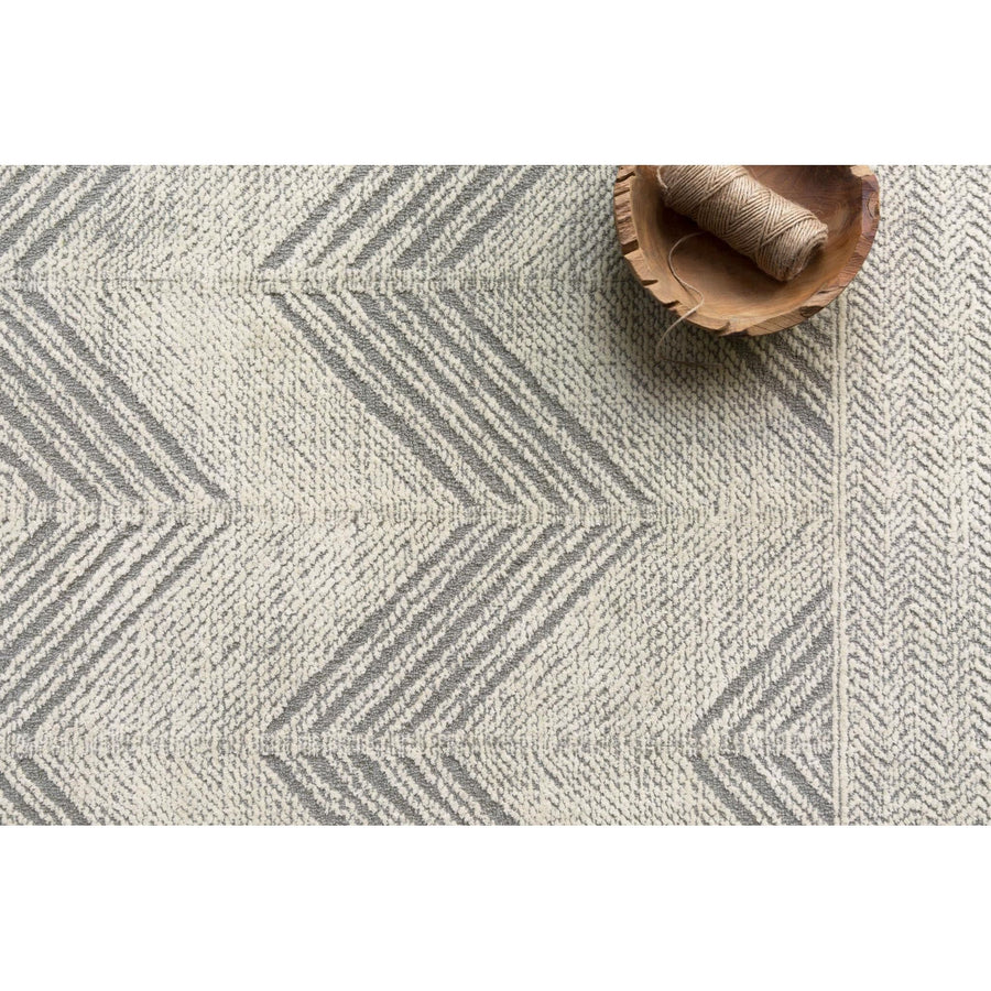 Kopa Grey/Ivory Rug - Amethyst Home With stunning and delicate linear patterns, the Kopa Collection provides an energetic and fresh canvas for a low profile, long-lasting 100% wool rug. Each design is hand-tufted by skilled artisans in India. Crafted by Loloi for ED Ellen DeGeneres.