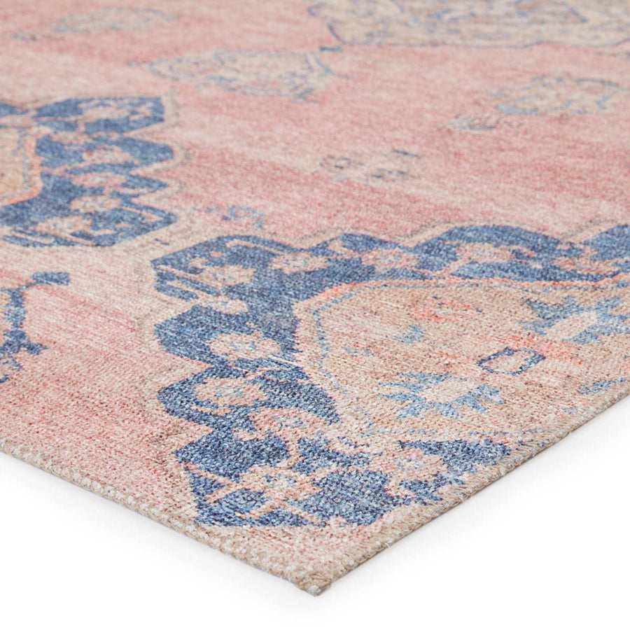 The Jaipur Living Kairos Adalee Area Rug, or KAR01, features dusty pink and blue diamond medallions with subtle distressing for a romantic, elegantly worn look. This power loomed area rug is family and pet friendly and a perfect choice for your living room, dining room, or other high traffic areas.