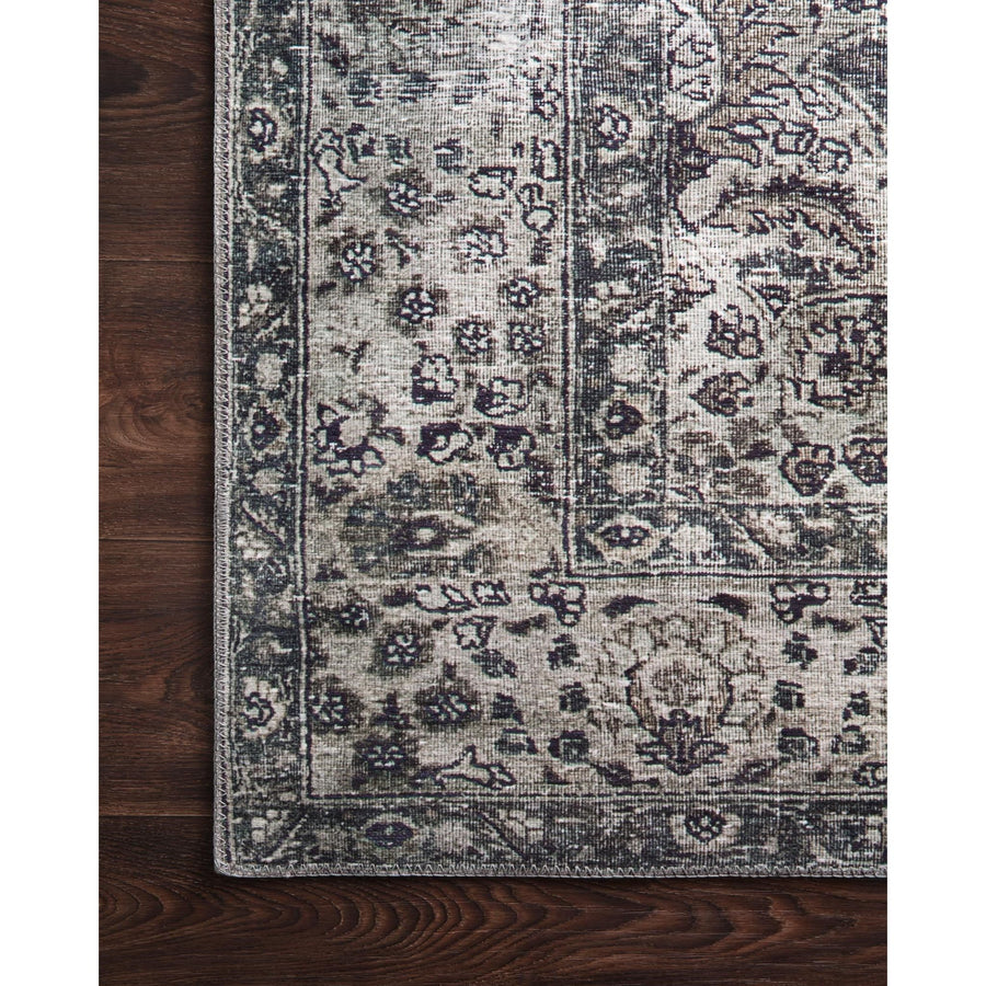 Layla Taupe/Stone Rug - Amethyst Home The Layla Collection is traditional and timeless, with a beautiful lived-in design that captures the spirit of an old-world rug. This traditional power-loomed rug is crafted of 100% polyester with a classic and sophisticated color palette and subtle patina.