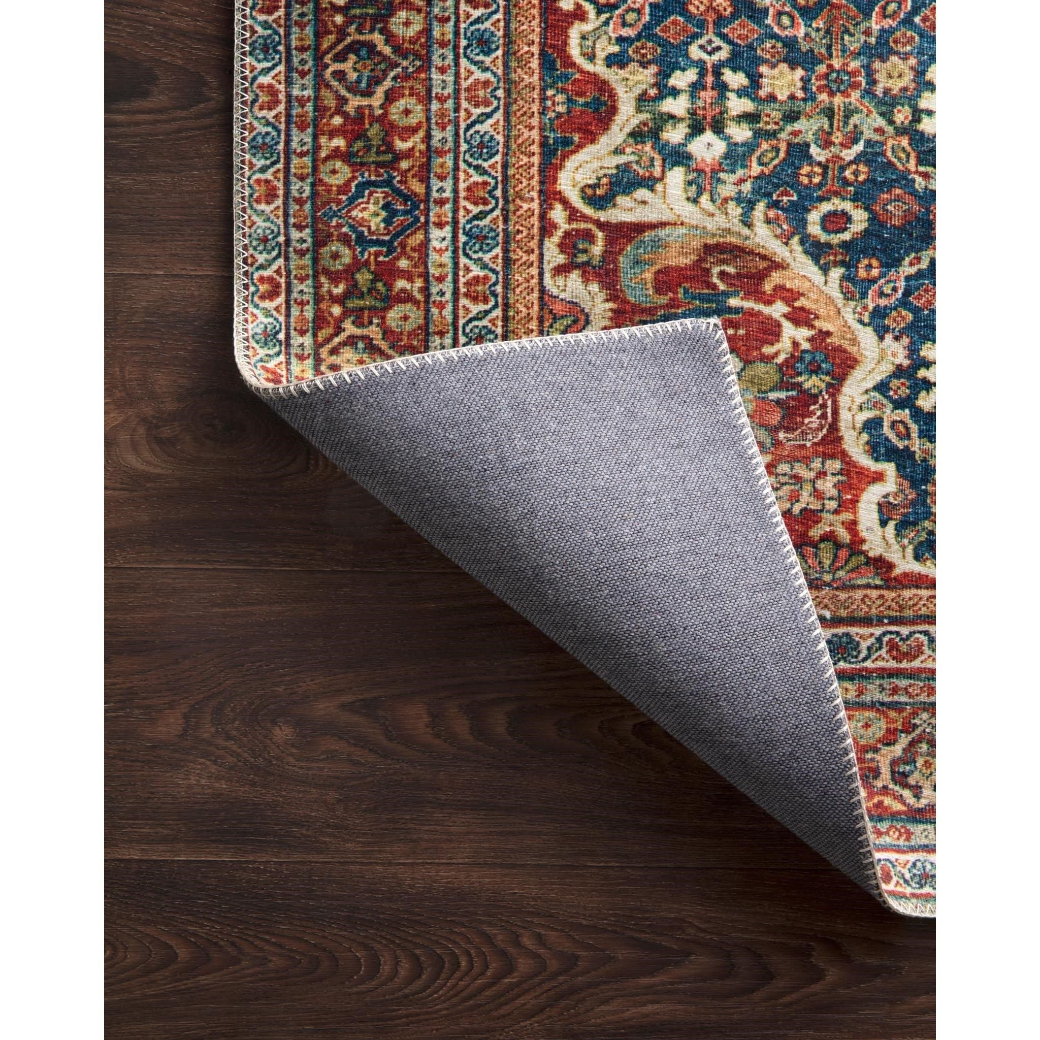 Perfect for families with kids and pets and very easy to clean and maintain. Comes in area, cute kitchen and hallway runners sizes. The rug is gorgeous with an intricate pattern and warms up the room with tones of blue, red, and ivory. The Layla Blue/Spice rug from Loloi captures the spirit of an old-world rug.