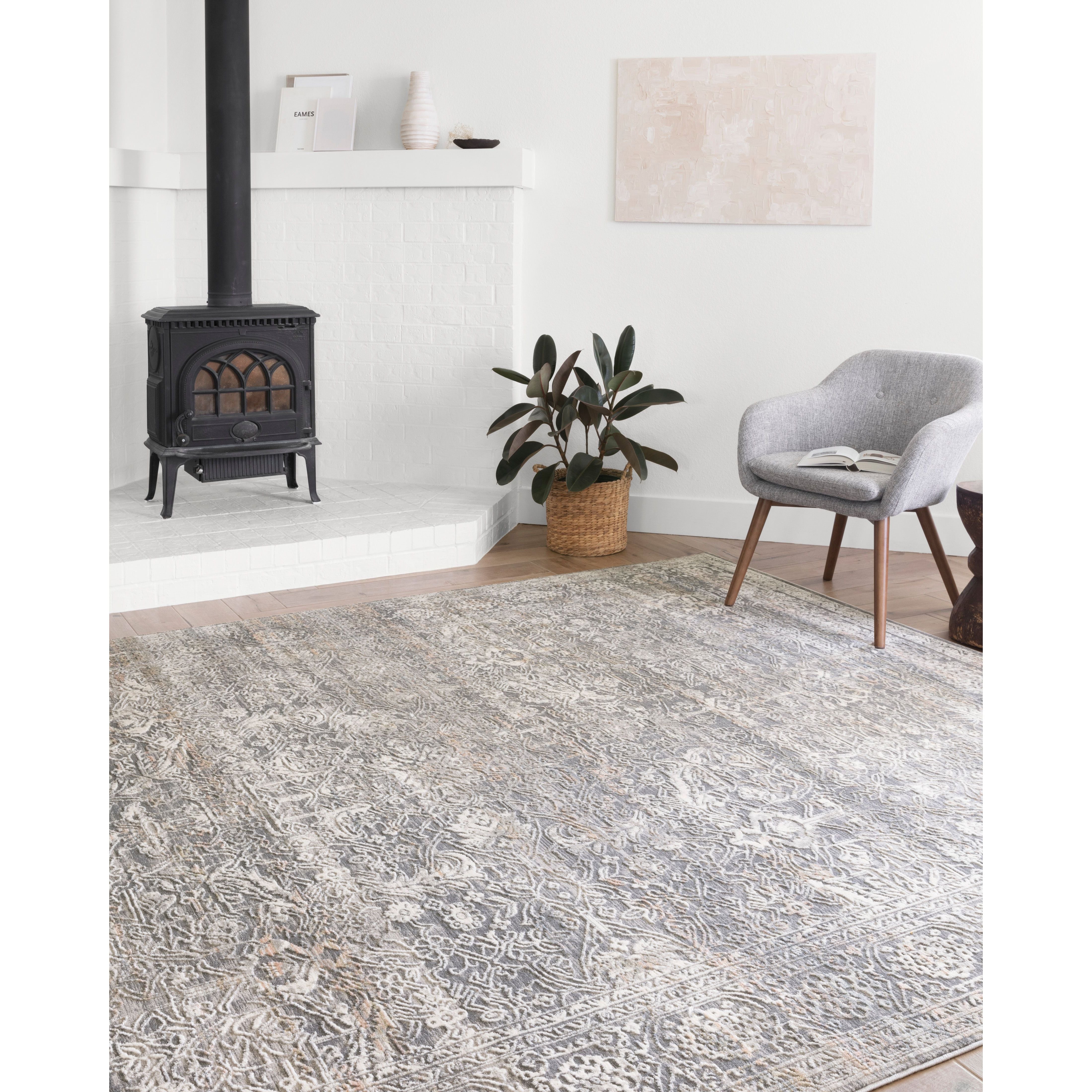 Lucia Steel/Ivory Rug - Amethyst Home The Lucia Collection is a beautifully rich statement piece to add a layer of sophistication to any room. Power-loomed of polypropylene & polyester with a high/low pile and a curated color palette for a high-end look at an affordable price.