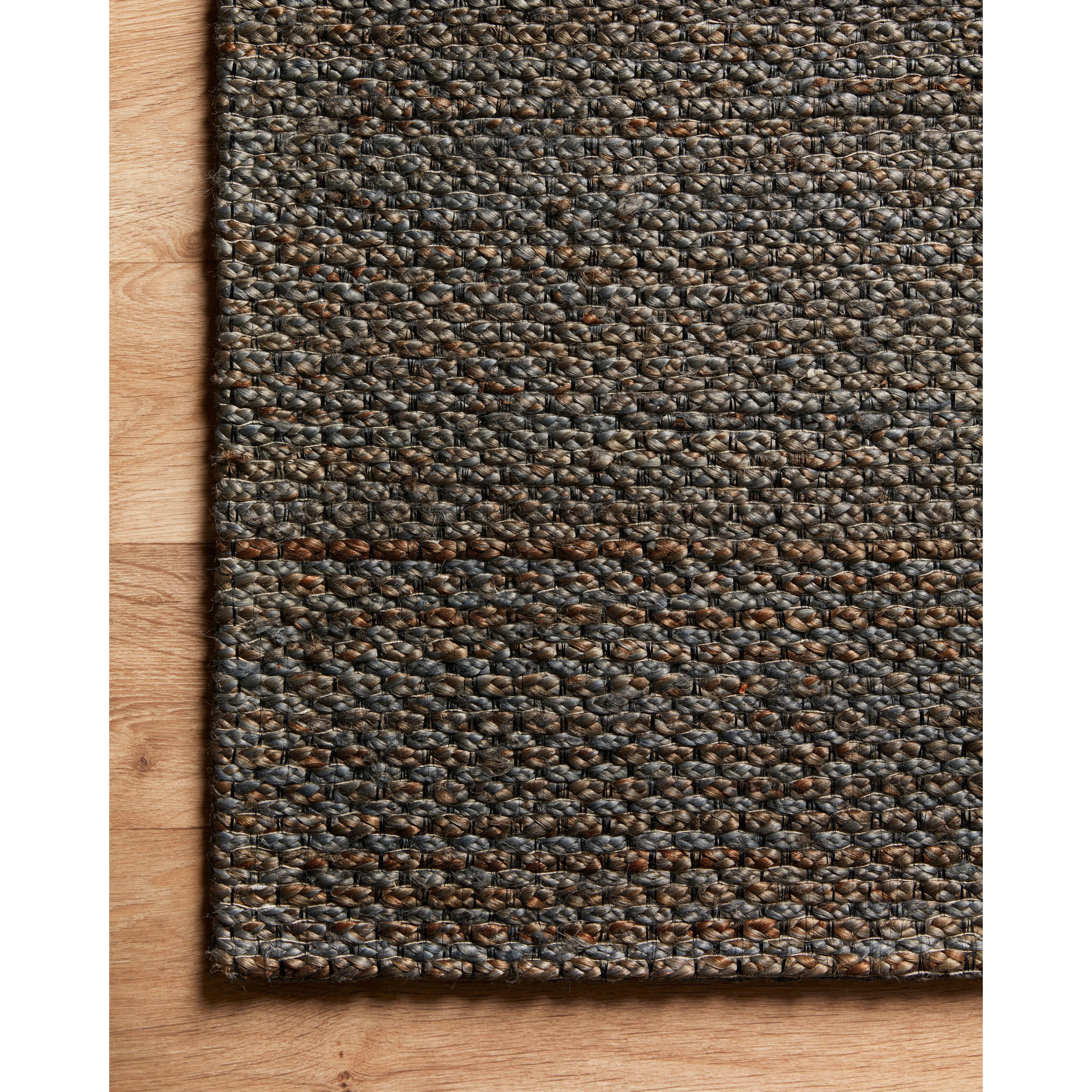 The Loloi Lily Blue Area Rug, or LIL-01 Blue, is an earthy base that isn't your average jute area rug. The hand-woven collection has an intricate yet subtle textural look that adds an elevated layer to any style. This area rug would be great for living rooms, dining rooms, or other high-traffic areas. 