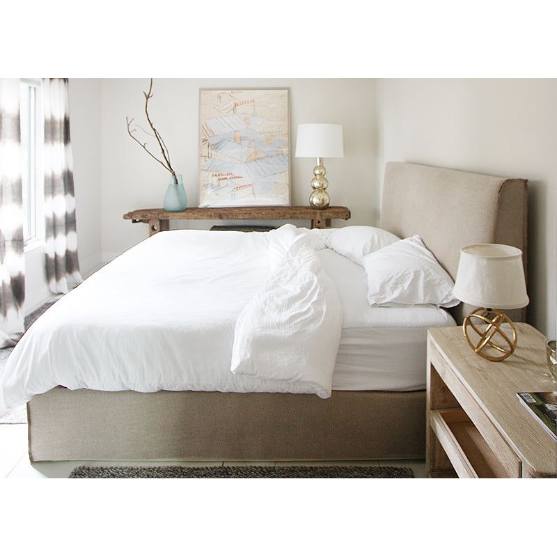 A Verellen essential, the Aimee Bed is a beautiful platform bed. Both comfy and durable, this comes standard with:  double needle stitch detail platform on glides available slipcovered not available with box spring Available in twin, full, queen, king, and California king mattresses.