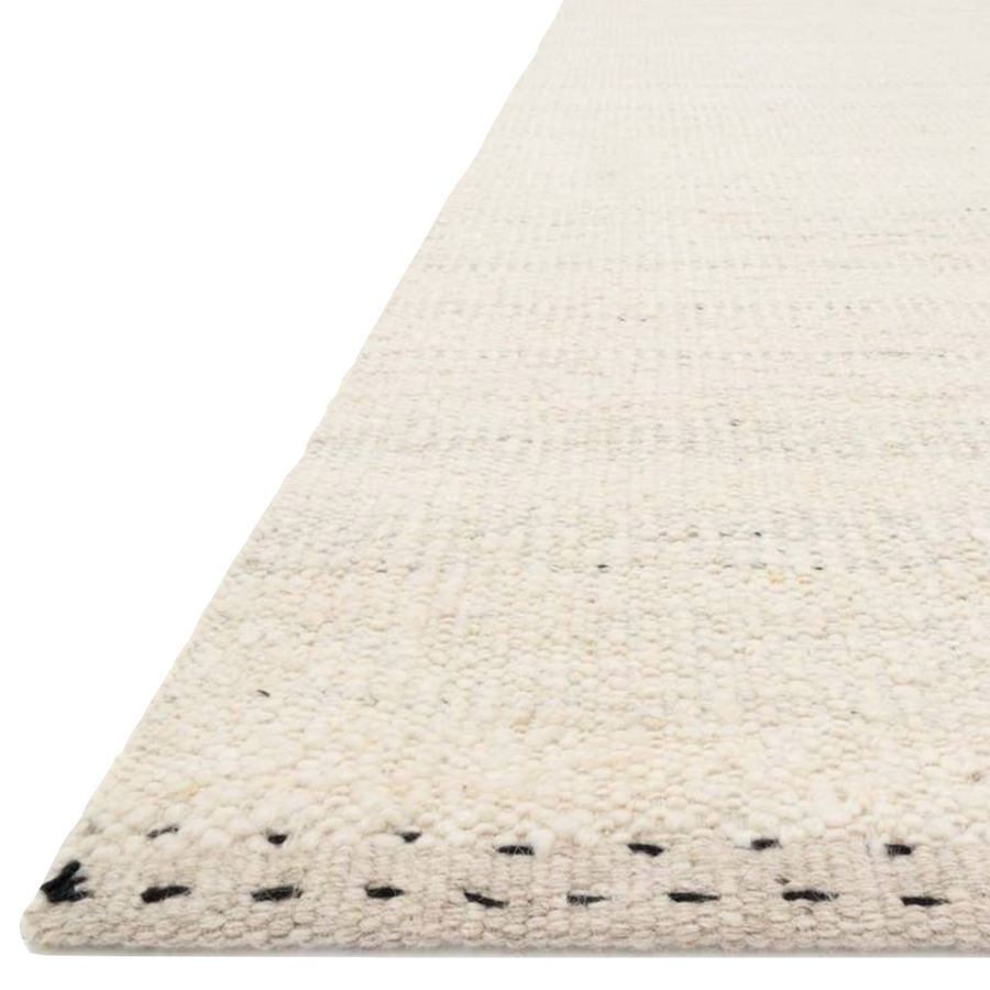 A perfect blend of refined and relaxed, the Sloane Collection is hand-woven of wool, cotton and polyester by artisans in India. Sloane offers a sophisticated foundation for a contemporarily bohemian look with perfectly woven stripes and minimalist appeal.  Hand Woven 79% Wool | 11% Cotton | 7% Polyester | 3% Other Fibers SLN-01 Oatmeal