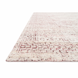Hand-knotted in India of viscose and cotton, the Vestige White / Berry Area Rug recalls ancient khotan rugs in an updated color palette. Soft underfoot, the silken yarns temper the graphic motifs to create a versatile foundation.  Hand Knotted 93% Viscose | 7% Cotton VQ-01 White / Berry