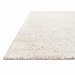 Hand-knotted in India of viscose and cotton, the Vestige White / Natural Area Rug recalls ancient khotan rugs in an updated color palette. Soft underfoot, the silken yarns temper the graphic motifs to create a versatile foundation.  Hand Knotted 89% Viscose | 11% Cotton VQ-01 White / Natural