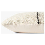 Experience the warmth and softness of the Amber Carla Ivory / Black Pillow. Hand woven with wool, polyester, and cotton, this pillow has a hidden flap closure and an antique bronze finish zipper with the Loloi logo. Finished with a knife edge and beige backing, this pillow will bring a cozy and inviting feeling to your home. Amethyst Home provides interior design, new home construction design consulting, vintage area rugs, and lighting in the Laguna Beach metro area.