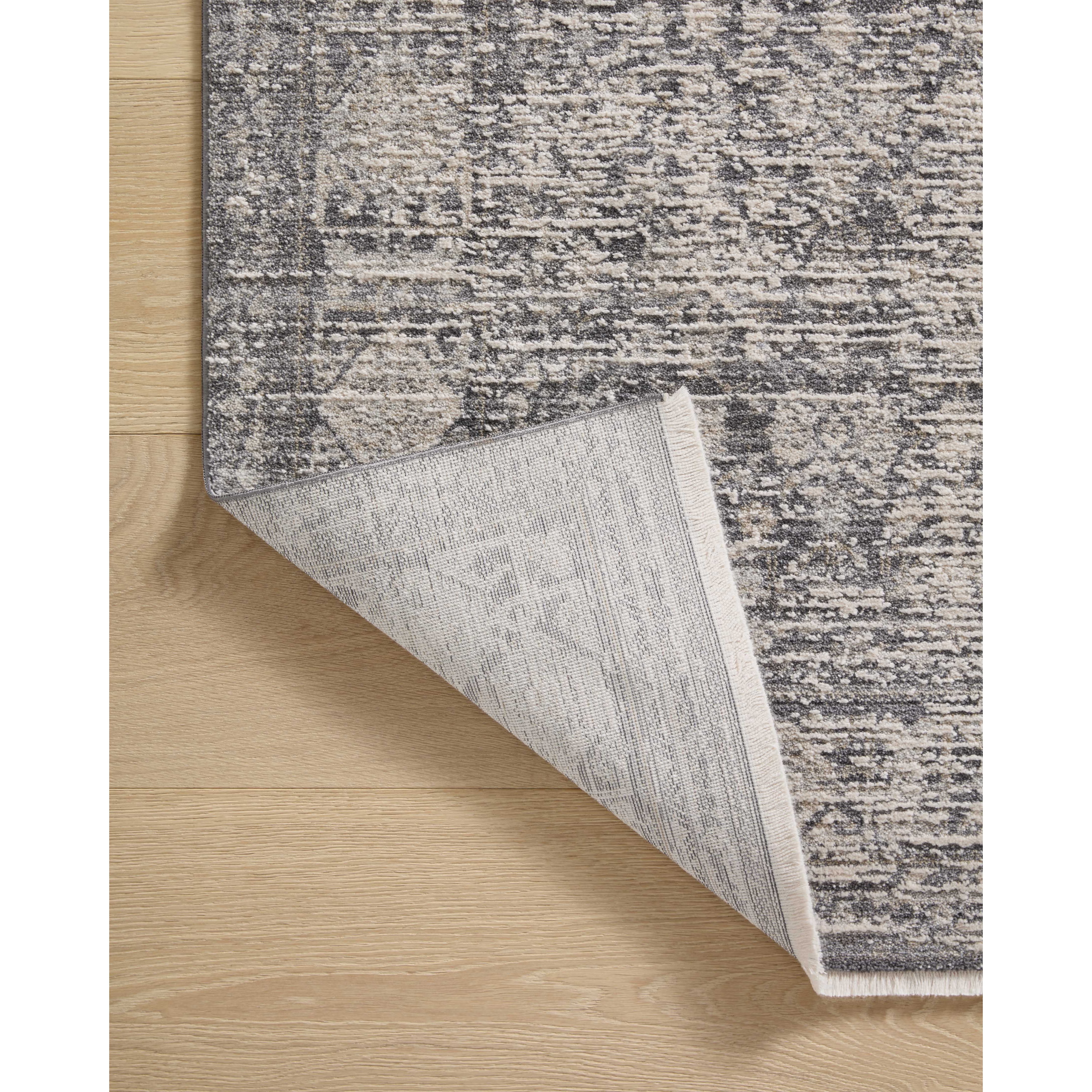 Featuring Amber Lewis x Loloi Alie Charcoal / Dove Rug by Loloi at Amethyst Home. Amber Lewis x Loloi Alie Charcoal / Dove Rug have an elevated antique look and plush, modern feel. The rug’s underlying traditional motif is overlaid with a slightly higher pile that creates a softening effect like early morning fog. The Alie Collection for Amber Lewis × Loloi is power-loomed in Turkey with durabi. Amethyst Home provides interior design services, furniture, rugs, and lighting in the Omaha metro area.