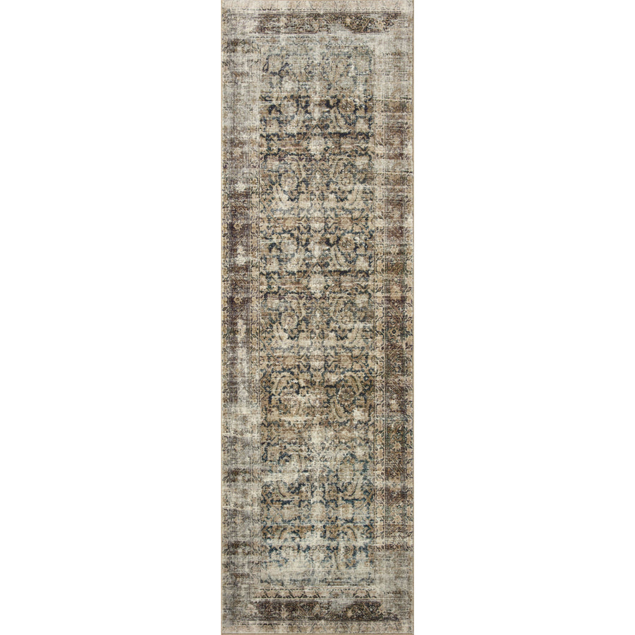 With the faded feel of an antique rug, the Amber Lewis x Loloi Morgan Navy / Sand Rug is a feat of modern printed construction. These impressive area rugs expertly blend sophisticated tones to recreate the dynamic colors of a vintage textiles. Power-loomed of CloudPile™ construction, these rugs are extra-soft to walk upon yet still durable for high-traffic rooms. Amethyst Home provides interior design services, furniture, rugs, and lighting in the Dallas metro area.