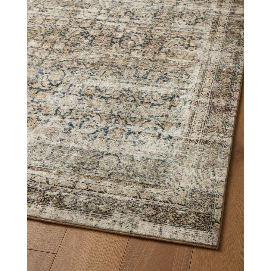 With the faded feel of an antique rug, the Amber Lewis x Loloi Morgan Navy / Sand Rug is a feat of modern printed construction. These impressive area rugs expertly blend sophisticated tones to recreate the dynamic colors of a vintage textiles. Power-loomed of CloudPile™ construction, these rugs are extra-soft to walk upon yet still durable for high-traffic rooms. Amethyst Home provides interior design services, furniture, rugs, and lighting in the Portland metro area.