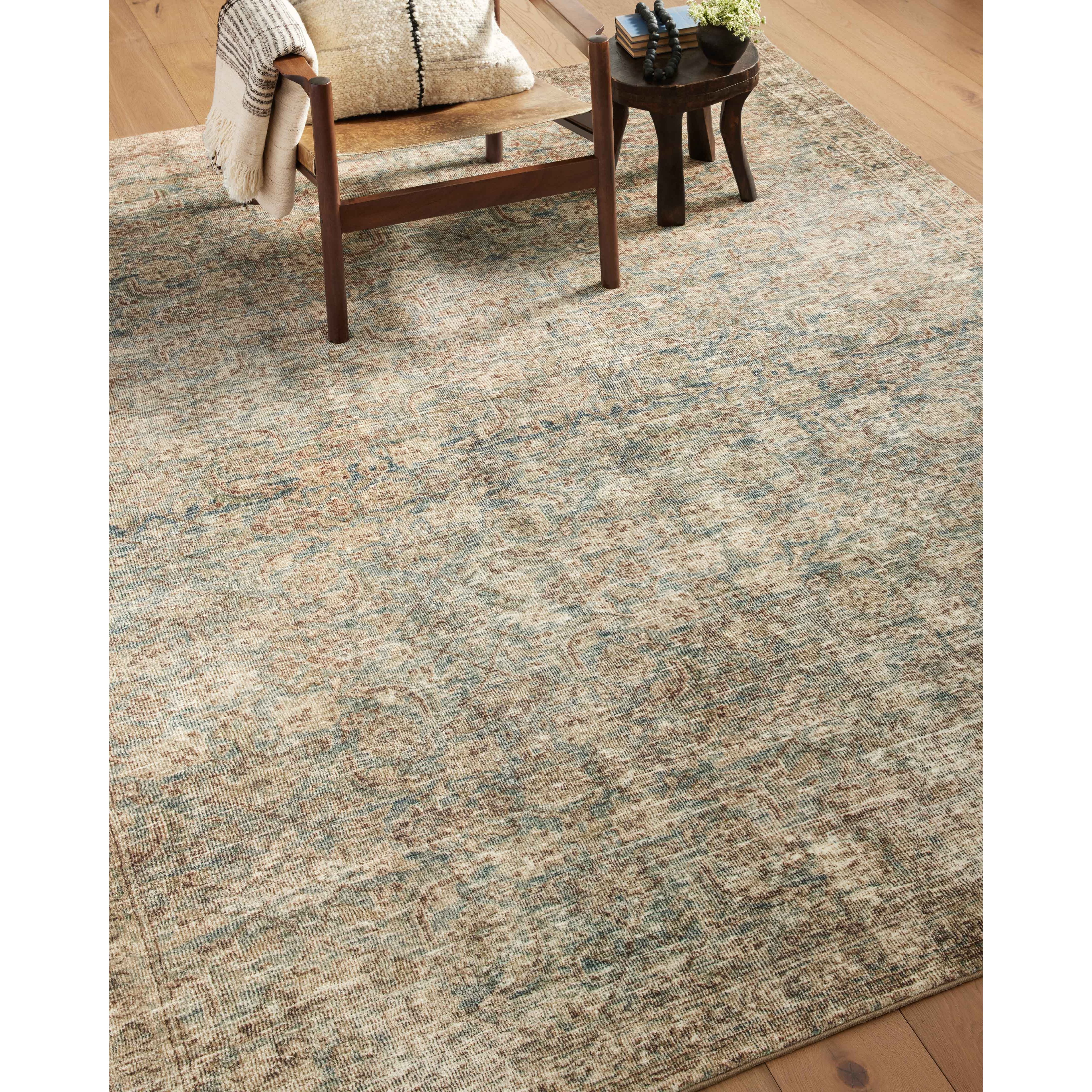 With the faded feel of an antique rug, the Amber Lewis x Loloi Morgan Sea / Sage Rug is a feat of modern printed construction. These impressive area rugs expertly blend sophisticated tones to recreate the dynamic colors of a vintage textiles. Power-loomed of CloudPile™ construction, these rugs are extra-soft to walk upon yet still durable for high-traffic rooms. Amethyst Home provides interior design services, furniture, rugs, and lighting in the Dallas metro area.