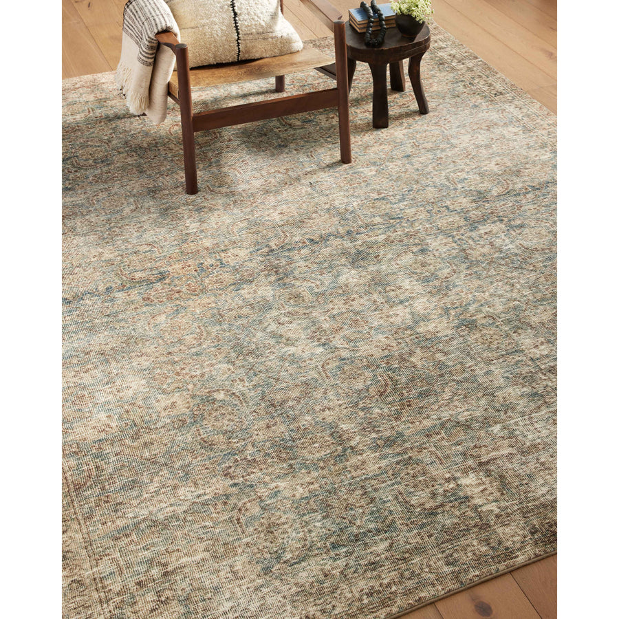 With the faded feel of an antique rug, the Amber Lewis x Loloi Morgan Sea / Sage Rug is a feat of modern printed construction. These impressive area rugs expertly blend sophisticated tones to recreate the dynamic colors of a vintage textiles. Power-loomed of CloudPile™ construction, these rugs are extra-soft to walk upon yet still durable for high-traffic rooms. Amethyst Home provides interior design services, furniture, rugs, and lighting in the Dallas metro area.