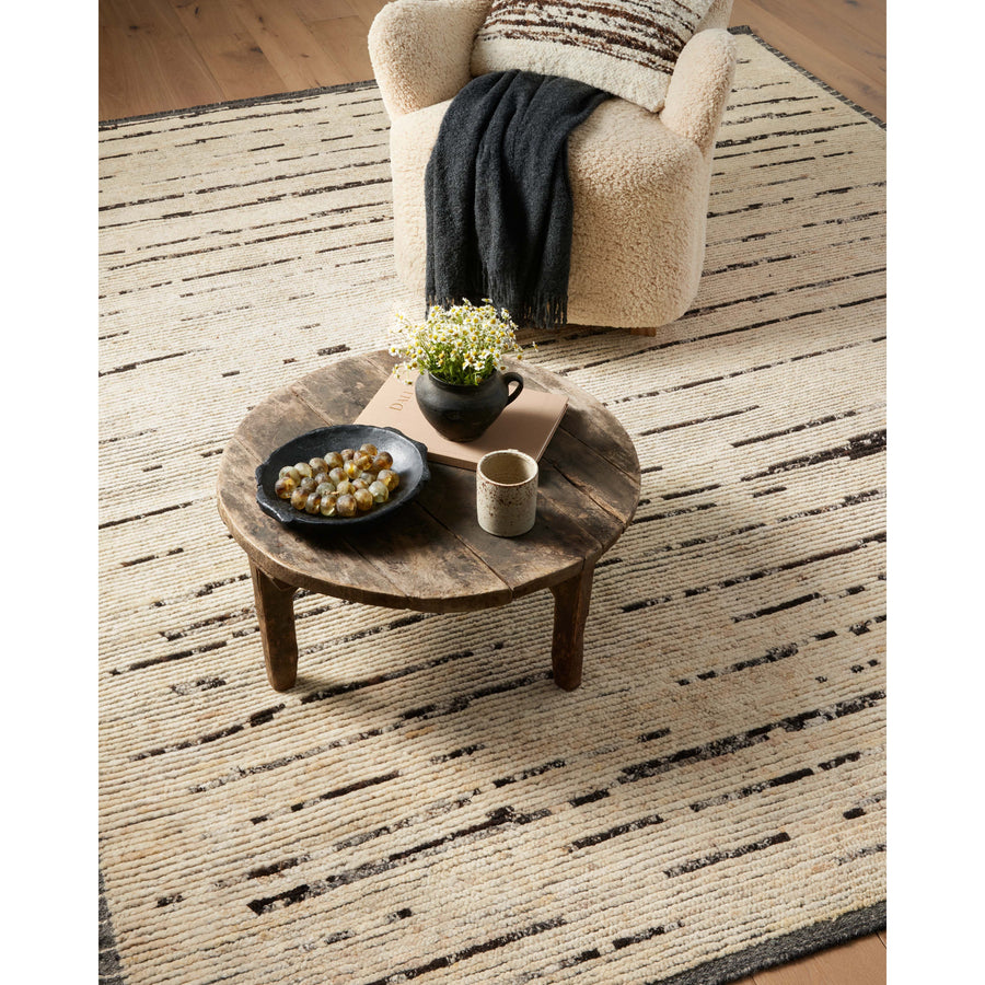 Amber Lewis x Loloi Briyana Natural / Black Rug combines the incredible ribbed texture of Moroccan rugs with clean, contemporary design, thanks to Lewis’s careful eye for details. Amethyst Home provides interior design services, furniture, rugs, and lighting in the Dallas metro area.