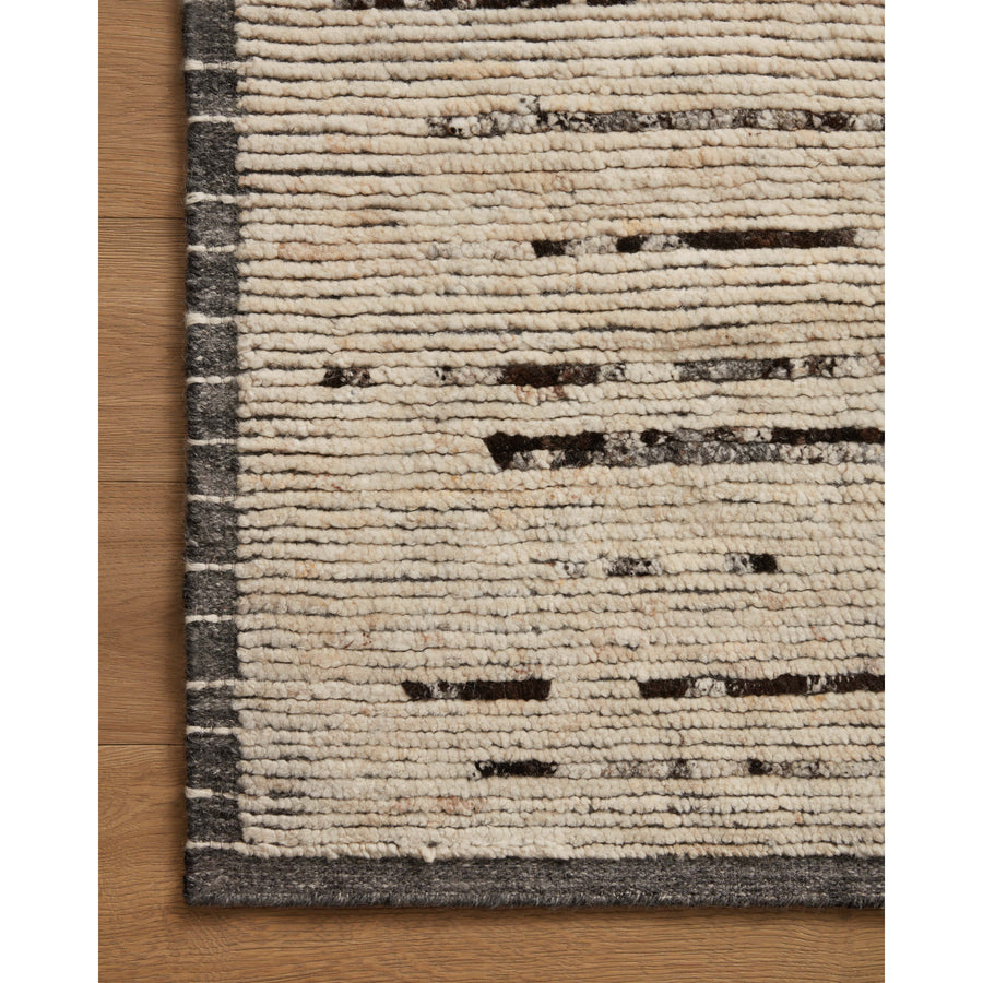 Amber Lewis x Loloi Briyana Natural / Black Rug combines the incredible ribbed texture of Moroccan rugs with clean, contemporary design, thanks to Lewis’s careful eye for details. Amethyst Home provides interior design services, furniture, rugs, and lighting in the Des Moines metro area.