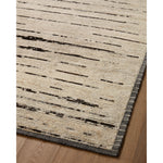 Featuring Amber Lewis x Loloi Briyana Natural / Black Hand-Knotted Rug by Loloi at Amethyst Home. Amber Lewis x Loloi Briyana Natural / Black Rug combines the incredible ribbed texture of Moroccan rugs with clean, contemporary design, thanks to Lewis’s careful eye for details. Each rug features a different pattern with elegant and uncluttered linework, while its border adds a subtle frami. Amethyst Home provides interior design services, furniture, rugs, and lighting in the Kansas City metro area.