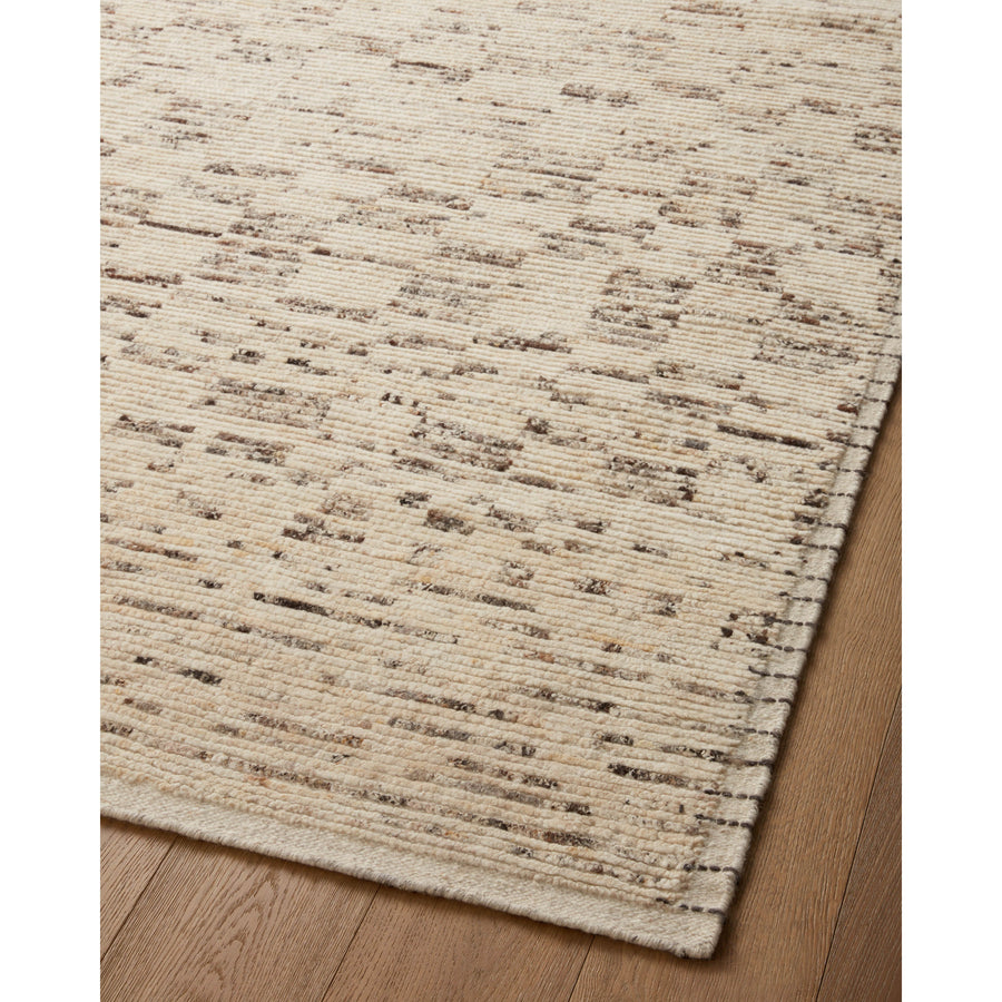 Amber Lewis x Loloi Briyana Natural / Granite Rug combines the incredible ribbed texture of Moroccan rugs with clean, contemporary design, thanks to Lewis’s careful eye for details.  Amethyst Home provides interior design services, furniture, rugs, and lighting in the Kansas City metro area.